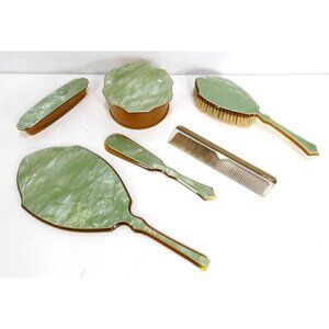 Green celluloid mirror, brush, comb, hair saver, shoe horn & nail buffer 1930's